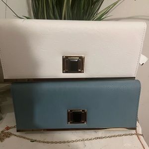 Two clutch bags one blue and one white